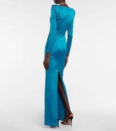 The Gable gown from Alex Perry is perfect for wedding parties or formal gatherings. Made from teal satin crêpe, the body-hugging style features a sweetheart neckline and bold, pointed shoulders..Made in China.Material: 12% polyester, 82% triacetate.Care instructions: dry clean.Designer color name: Teal.Closure: concealed zipper.Shoulder pads.True to size.Oversized shoulders.Shoulder pad inserts.Internal boned corset for support.Fitted.Mid-weight material.The model seen in the picture is 178cm-5' Fitted Satin Finish Maxi Evening Dress, Fitted Satin Finish Cocktail Gown, Fitted Satin Evening Dress For Formal Occasions, Formal Fitted Satin Evening Dress, Formal Fitted Gown With Satin Finish, Blue Fitted Gown With Bias Cut, Fitted Blue Gown With Bias Cut, Fitted Satin Finish Gown For Gala, Fitted Blue Bias Cut Gown