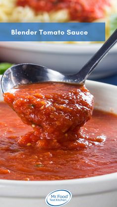 a spoon full of tomato sauce with the words blender tomato sauce above it and below