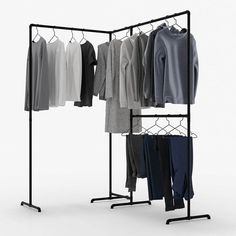 a clothes rack with several shirts hanging on it's sides and two hangers holding sweaters