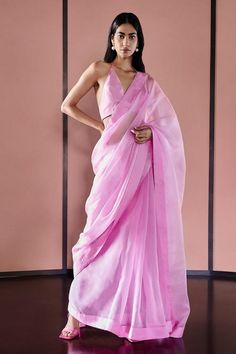 Blush pink handwoven saree in organza base. Comes with an unstitched blouse fabric.
Components: 2
Pattern: Solid
Fabric: Organza
Color: Pink
Other Details: 
Dimensions :
Saree Length : Approx 5.5 mtrs
Saree Width : 45 inches
Unstitched Blouse Length : Approx 1 mtr
Unstitched Blouse Width : 45 inches
Note :
Stitched blouse worn by the model is not for sale.
Kindly contact customer care in order to purchase the blouse as seen on the model.
Occasion: Wedding - Aza Fashions Ekaya Banaras, Bride Things, Pink Organza Saree, Organza Sari, Statement Blouse, Desi Wear, Plain Saree, Desi Fashion Casual, Organza Sarees