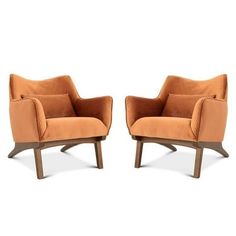 a pair of orange chairs sitting next to each other