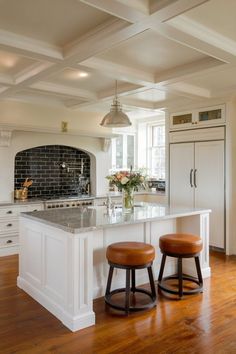 A kitchen with a painted brick backsplash that brings a rustic charm to the modern space. Painted Brick Kitchen, Brick Kitchen Backsplash Ideas, Brick Kitchen Backsplash, Kitchen Backsplash Ideas