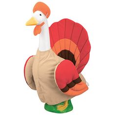 an inflatable turkey sitting on top of a green base with a white head