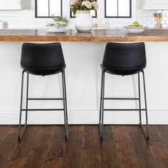 Experience elegance and comfort with the Middlebrook Prusiner 29-inch Faux Leather Bar Stool, Set of 2. The sleek and contemporary design features a curved faux leather seat and backrest that offers comfortable support for hours. Black Barstools In Kitchen, White Kitchen Lighting, Black Stool, Leather Kitchen, Bar Height Stools, Black Bar Stools, Leather Bar Stools, Leather Bar, Counter Bar Stools