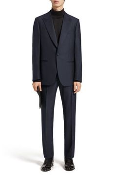 A sumptuous choice for formal wear, this classically styled navy tuxedo is impeccably tailored in Italy from a blend of superfine wool and lustrous silk. Jacket has one-button closure; peaked lapels; chest pocket; welt pockets

 Trousers have zip fly with hook-and-bar closure

 Jacket is lined; trousers are lined to the knee 85% wool, 15% silk Dry clean Made in Italy Men's Designer Clothing Elegant Navy Tuxedo For Semi-formal Occasions, Luxury Navy Tuxedo For Formal Occasions, Luxury Navy Tuxedo For Formal Events, Navy Elegant Business Tuxedo, Elegant Navy Tuxedo For Business, Luxury Navy Formal Tuxedo, Navy Elegant Tuxedo, Elegant Navy Tuxedo, Elegant Navy Slim Fit Suit