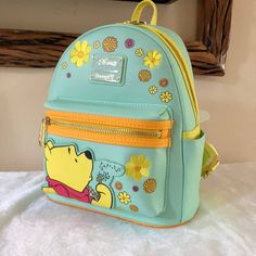 -Authentic, Brand New With Tags Loungefly Disney Winnie The Pooh Floral Mini Backpack -You Will Receive The Exact Bag Pictured -Super Cute, A Great Collectible For Pooh Fans -Comes From A Smoke Free, Pet Free Home. -I Ship Within 1-2 Days From Purchase. -Please Request For More Photos If Needed. -Check Out My Other Items! Bundle For A Discount. Cinderella Pink Dress, Mini Backpack Purse, Disney Pixar Up, Loungefly Bag, Faux Leather Backpack, Loungefly Disney, Disney Lilo, Disney Winnie The Pooh, Mini Backpack