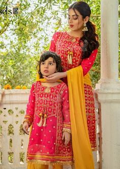 Make your Events memorable with this Beautiful Mom and Daughter dress. 3 Piece Embroidered Suit for Women Description : Kameez (Shirt) : Fabric beautifully embroidered zari and sequins work chiffon with attached lining. Shalwaar (Trouser) : Jamawar pants. Dupatta (Scarf) : Dupatta. Country of Origin : Pakistan General Care Instruction : Should be washed in gentle cycle and hung to dry. Color may bleed so please be mindful of other items with it. General Disclaimer Size chart provides reference s Traditional Jamawar Dress With Mirror Work, Embroidered Chinon Dress For Diwali, Eid Dress With Mirror Work And Jamawar Material, Eid Dress With Mirror Work In Jamawar Fabric, Eid Dress With Mirror Work And Jamawar Fabric, Eid Jamawar Dresses With Mirror Work, Jamawar Dresses With Mirror Work For Festivals, Eid Dress With Mirror Work In Chinon, Traditional Chinon Dress With Mirror Work