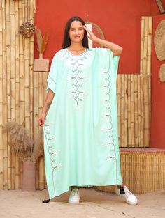 "An elegant Moroccan caftan will make you feel like African royalty. It's extremely elegant with a dash of classy cotton embroidery in the front. Ideal for plus size women as well. Made of extremely soft fabric to make you feel free and beautiful at the same time.  This Kaftan is ideal to wear for any casual occasion. Whether taking a trip down the shopping lane, or home-based kitty parties, or about anything else, wearing this dress will make you feel classy and comfortable. Fabric : 70% Egypti Summer Kaftan, African Royalty, Cotton Caftan, Kitty Party, Moroccan Caftan, Cotton Embroidery, Light Turquoise, Dress Clothes For Women, Soft Fabric