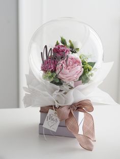 a bouquet of flowers in a glass vase