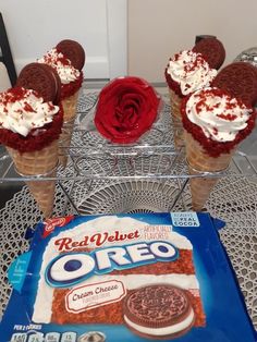 three ice cream cones with red velvete oreo cookies