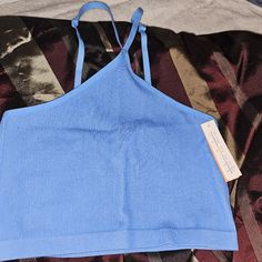 New W Tags Baby Blue Size Xl Light Blue Fitted Seamless Crop Top, Fitted Seamless Light Blue Crop Top, Fitted Light Blue Seamless Crop Top, Blue Cami Tank Top For Loungewear, Blue Seamless Camisole For Spring, Seamless Bra For Spring, Blue Bra-friendly Camisole Crop Top, Stretch Blue Camisole For Loungewear, Blue Top With Built-in Bra For Loungewear