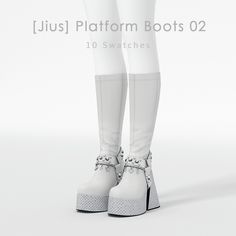 a pair of white high heeled boots with bows on the side and straps around the ankles