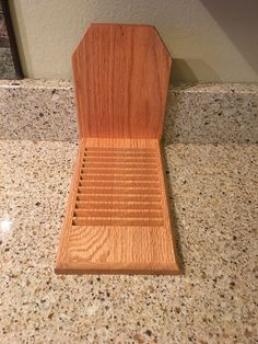 a wooden object sitting on top of a counter