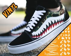 "Shark Vans Vinyl Stencil Available in 2 sizes: S, M. Small (works best Kids/ Womens sneaker sizes) Medium (works best for Mens sneaker sizes) You will receive one full 12\"x12\" wide sheet of vinyl. This sheet will contain all the stencils needed to complete one pair of the Shark Vans as you'll see in our video below! Incredibly easy to use and we have everything laid out cleanly for customizers of any experience to tackle this project. Ready to ship in 2 - 3 business days To see the stencil in Custom Vans Old Skool, Bape Vans, Camo Stencil, Camo Vans, Cool Vans Shoes, Chitenge Outfits, Customize Shoes, Vans Shoes Women, Bape Camo