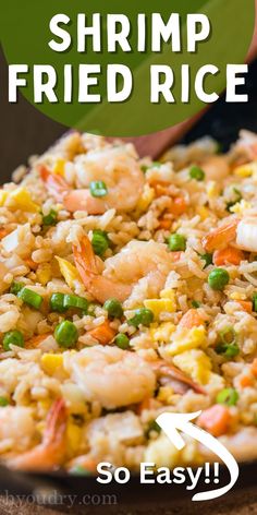 shrimp fried rice with peas and carrots in a skillet