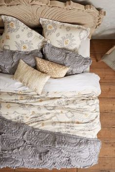 a collage of pictures showing different types of bedding and pillows on a wooden floor