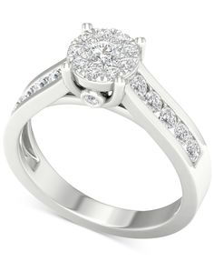 a white gold engagement ring with diamonds on it