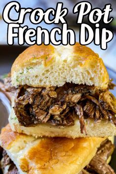 the crock pot french dip sandwich is stacked on top of each other