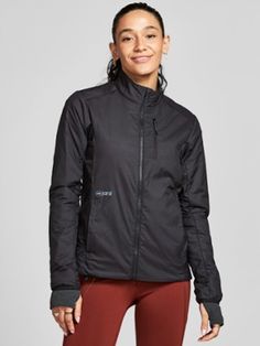 Be ready for whatever your winter workouts may bring—from cold temps to windy weather. The women's Janji Thermalrunner insulated jacket offers protection from the elements without extra unwanted bulk. Winter Athleisure Activewear With Fleece Lining, Winter Windproof Nylon Activewear, Winter Windproof Sporty Activewear, Winter Sportswear Outerwear With Moisture-wicking, Moisture-wicking Winter Sportswear Outerwear, Winter Sporty Windproof Activewear, Moisture-wicking Midweight Black Outerwear, Black Moisture-wicking Midweight Outerwear, Sporty Windproof Winter Activewear