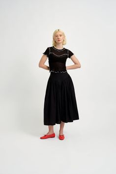 This midi length skirt in black linen fabric features a flattering basque waistband and is fully lined with cotton. Complete with charming black velvet bows on the side, this skirt has pockets for everything you need. - 100% Linen - Wash in cool water and lay flat to dry - Made in Canada Flat measurements in inches are as follows: Size - Waist - Hip - Length (Waist - Hem)XS: 24.5, 37+, 31.5S: 26.5, 41+, 31.5M: 28.5, 44+, 31.5L: 30.5, 47+, 31.5XL: 32.5, 50+, 31.5XXL: 34.5, 54+, 31.5 Canada Fits, Black Linen Fabric, Black Velvet Bow, Velvet Bows, Midi Length Skirts, Velvet Bow, Linen Skirt, Waist Jeans, Black Linen