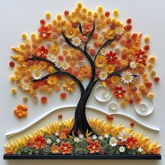 a tree made out of buttons and flowers on a white background with an orange center