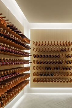 there are many pairs of shoes on the wall