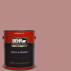 an orange paint can with the words behr premium plus painted on it's side