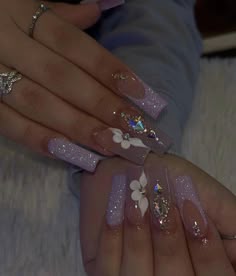 Lilac Baddie Nails, Lavender Baddie Nails, Latina Nail Designs Purple, Silver And Purple Acrylic Nails, Purple Prom Nails Coffin, Soft Makeup Look With Rhinestones, Short Acrylics With Rhinestones, Purple Xv Nails, Purple Bling Nails Rhinestones