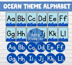 the ocean theme alphabet is displayed on a white brick wall