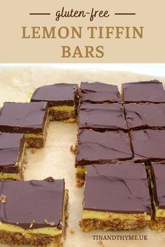 there are many bars that have chocolate frosting on them, and the words gluten - free lemon tiffin bars