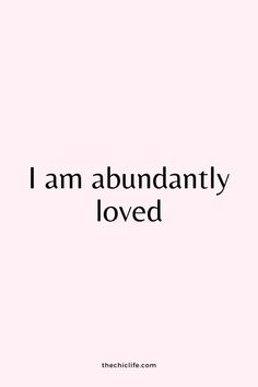 the words i am abundantly loved are in black and white on a pink background