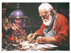 an older man is working on some items in his workshop with a lamp behind him