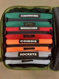 several zippered pouches are stacked on top of each other