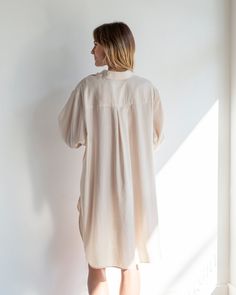 An oversized and lightweight shirt-dress by John Patrick. A breezy and effortless option for your warm weather wardrobe. Relaxed Fit Short Sleeve Tunic For Loungewear, Casual Oversized Shirt Dress For Vacation, Casual Beige Shirt Dress With Relaxed Fit, Casual Beige Relaxed Fit Shirt Dress, Chic Oversized Shirt Dress For Vacation, Oversized Short Sleeve Tunic For Loungewear, Oversized Collared Shirt Dress For Day Out, Oversized Beige Shirt Dress For Summer, Beige Relaxed Fit Casual Shirt Dress