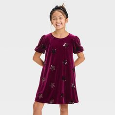 Give your kid's wardrobe a makeover with this Short-Sleeve Sequin 'Star' Velour Dress from Cat & Jack™. Made of recycled polyester and spandex, this knee-length dress features allover sequin stars for a shimmery effect. Designed with short sleeves, this knee-length dress also features a button keyhole back for ease of wear. Cat & Jack™: Designed for all children so you can trust it's made for yours. Plaid Flannel Dress, Tulle Skirt Dress, Holiday Party Dress, Kids Garments, Kids Party Dresses, Velour Dress, Kids Wardrobe, Velour Fabric, Holiday Party Dresses