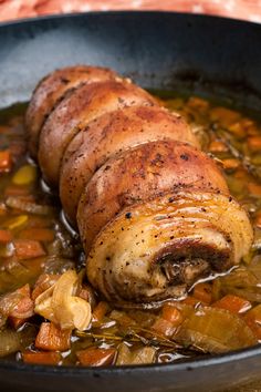 some food is being cooked in a skillet