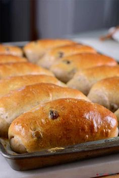 freshly baked bread sitting in a baking pan