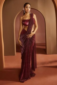 Shop for these amazing collections of Maroon Lurex Embroidered Humaida Shimmer Pre-draped Saree With Blouse For Women by SAANJH BY LEA online at Aza Fashions. Saree Branding, Indian Lehangas, Cocktail Sarees, Draped Sarees, Pre Draped Saree, Simple Dress For Girl, Sequins Saree, Draped Saree, Saree Draping Styles