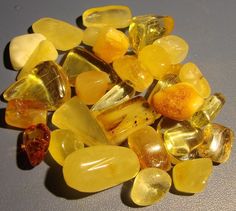 some yellow and brown rocks on a table