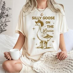 Silly Goose Shirt, Silly Goose On The Loose,  Cute Goose Shirt Gifts for Farm Girls, Funny Tee, Funny Graphic Tee, 90s Aesthetic Shirt : 100% Cotton (fiber content may vary for different colors) .: Medium fabric (5.3 oz/yd² (180 g/m .: Classic fit .: Runs true to size HOW TO ORDER Pick you favorite design. Review the size & color charts above FIRST and then select shirt size and color from the dropdown menu. Indicate the birthday year in the personalization box. Please note size measurements for Cricut Tee Shirt Ideas, Cute Goose, Building Things, Cozy Clothes, Silhouette Diy, Diy Shirts, Christmas T Shirt Design, Aesthetic Shirt