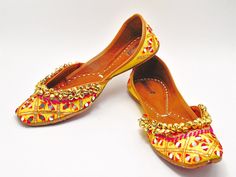 Ethnic Indian/Pakistani style shoes durable and hand stitched with genuine leather sole and leather padded cushion inside.t These gorgeous Khusa are in bright yellow with beautiful embroidery with mirror work. These have traditional Indian ghungru / Brass bells on top to add that extra Indian touch. They offer comfort and style, while still looking fabulous in these. Perfect or brides or everyday outfits. We offer many different designs of shoes to choose from. See our page for more of our colle Handwork Leather Flats For Festivals, Leather Flats With Handwork For Festivals, Handwork Flats For Festive Summer Occasions, Bohemian Embroidered Flats For Festivals, Closed Toe Flats With Handwork For Summer, Bohemian Slip-on Flats For Festival, Festive Bohemian Slip-on Flats, Bohemian Slip-on Flats For Festive Occasions, Festive Summer Slip-on Flats