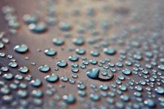 drops of water on the surface of a table