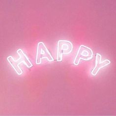 a neon sign that says happy in the shape of letters on a pink background with white lights