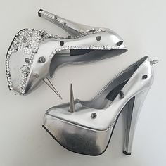 6 Inch Heel Metallic Silver M Made Upper Assorted Swarovski Rhinestones Gin Metal Silver Spikes Sold As Is Unfinished Exposed Screws On Inside Ooak Custom New Never Worn Damage On Pix Some Loose Spikes And Stones Formal Heels With Rhinestone Rivets And Round Toe, Silver Heels With Spikes For Formal Occasions, Silver Spiked Heels For Formal Occasions, Silver Heels With Spikes For Party, Silver Spiked Heels For Party, Glamorous Spiked Round Toe Heels, Silver High Heels With Rhinestone Rivets, Crystal Spikes, Silver Platforms