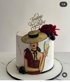 a birthday cake decorated with an image of a woman holding a wine glass and a rose