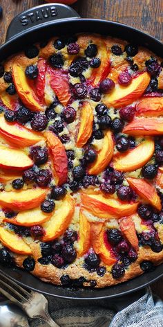 Peach and Blueberry Skillet Cake in a cast-iron skillet Blueberry Skillet, Peach Dessert, Skillet Cake, Infused Sugar, Peach Dessert Recipes, Peach Blueberry, Sugar Recipes, Sour Cream Cake, Blueberry Desserts