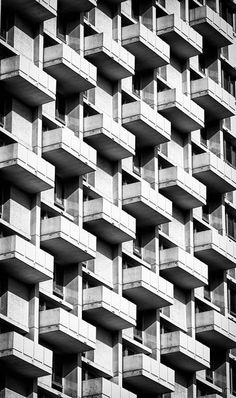 a very tall building with balconies on the sides