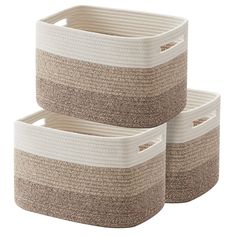 two white and beige baskets with handles