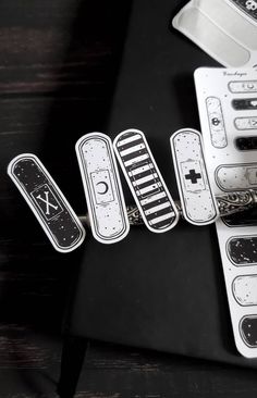 several nintendo wii remotes sitting next to each other on a table