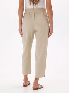 Made from a sustainable blend of Lyocell and Linen, the Winnie Woven Pant features a relaxed fit and elastic waistband. Casual Cropped Bottoms For Daywear, Casual Cropped Leg Bottoms For Daywear, Versatile Relaxed Fit Viscose Bottoms, Relaxed Fit Viscose Bottoms, Versatile Relaxed Fit Viscose Pants, Casual Bottoms With Straight Hem For Daywear, Cropped Leg Bottoms With Elastic Waistband For Daywear, Beige Relaxed Fit Cropped Pants, Casual Pants With Straight Hem For Daywear